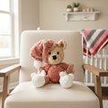 Handmade Crochet Teddy Bear in Nursery Setting